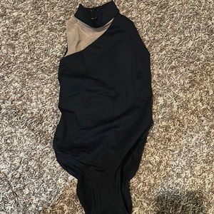 Black leotard with Asian mesh panels on right shoulder and back